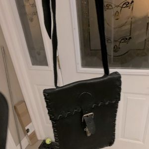 Handcrafted leather satchel body cross bag.